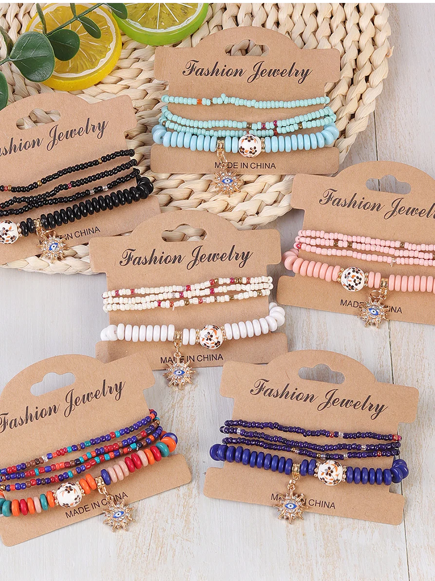 Hot Selling Bohemian Style Multi-layer Rice Bead Bracelet Stacked With Evil Eye Pendant Handmade Adjustable Jewelry